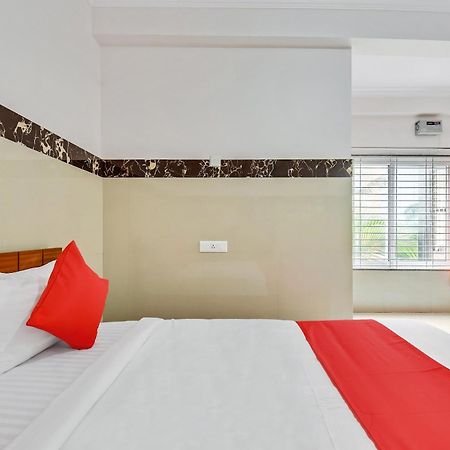 Hotel O Sri Sai Guru Comforts Yelahanka Kültér fotó