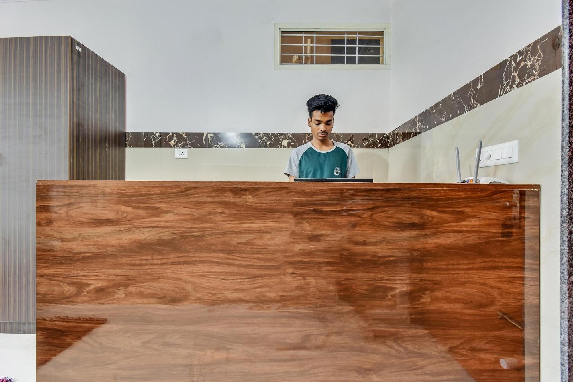 Hotel O Sri Sai Guru Comforts Yelahanka Kültér fotó