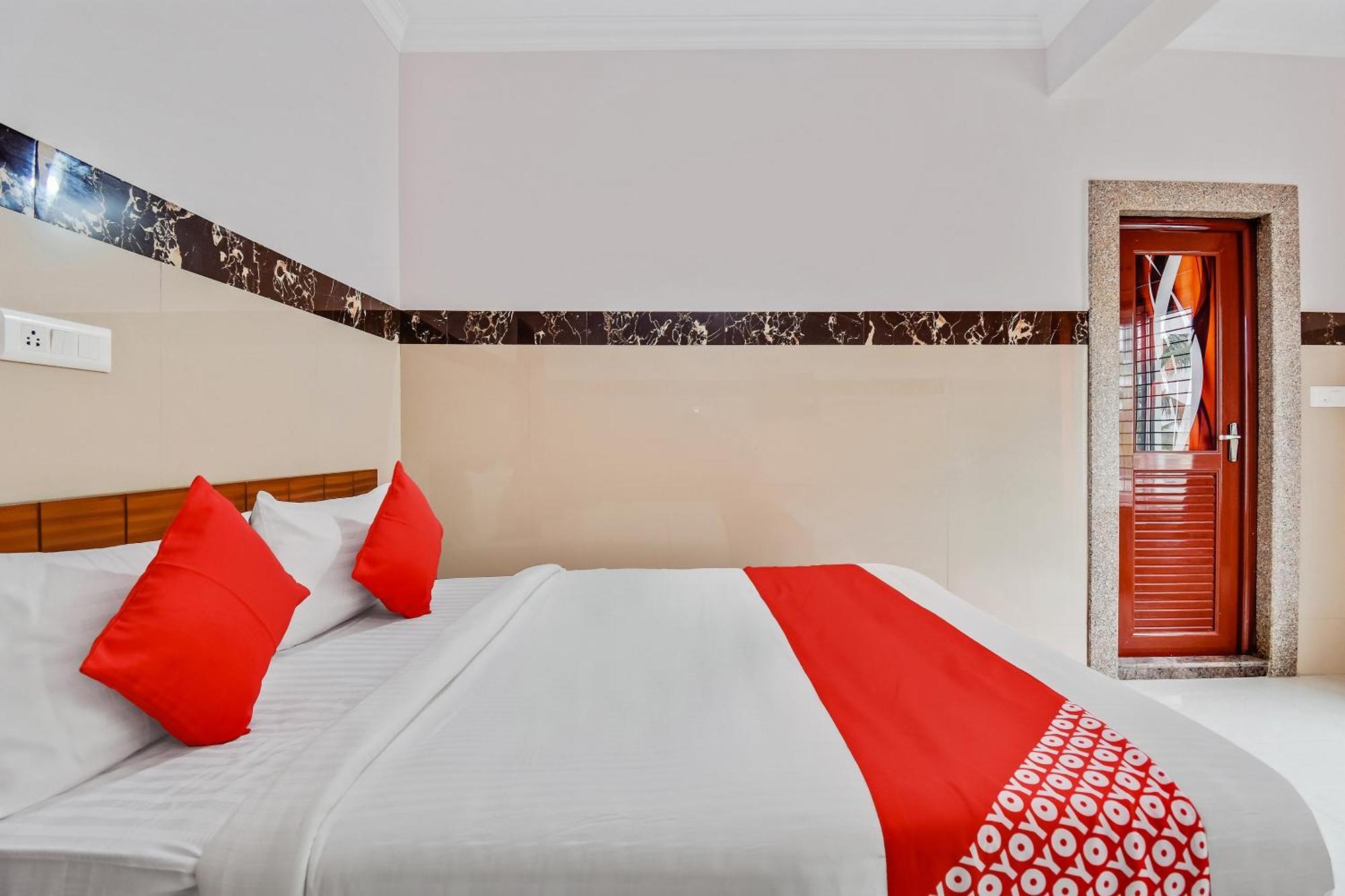 Hotel O Sri Sai Guru Comforts Yelahanka Kültér fotó