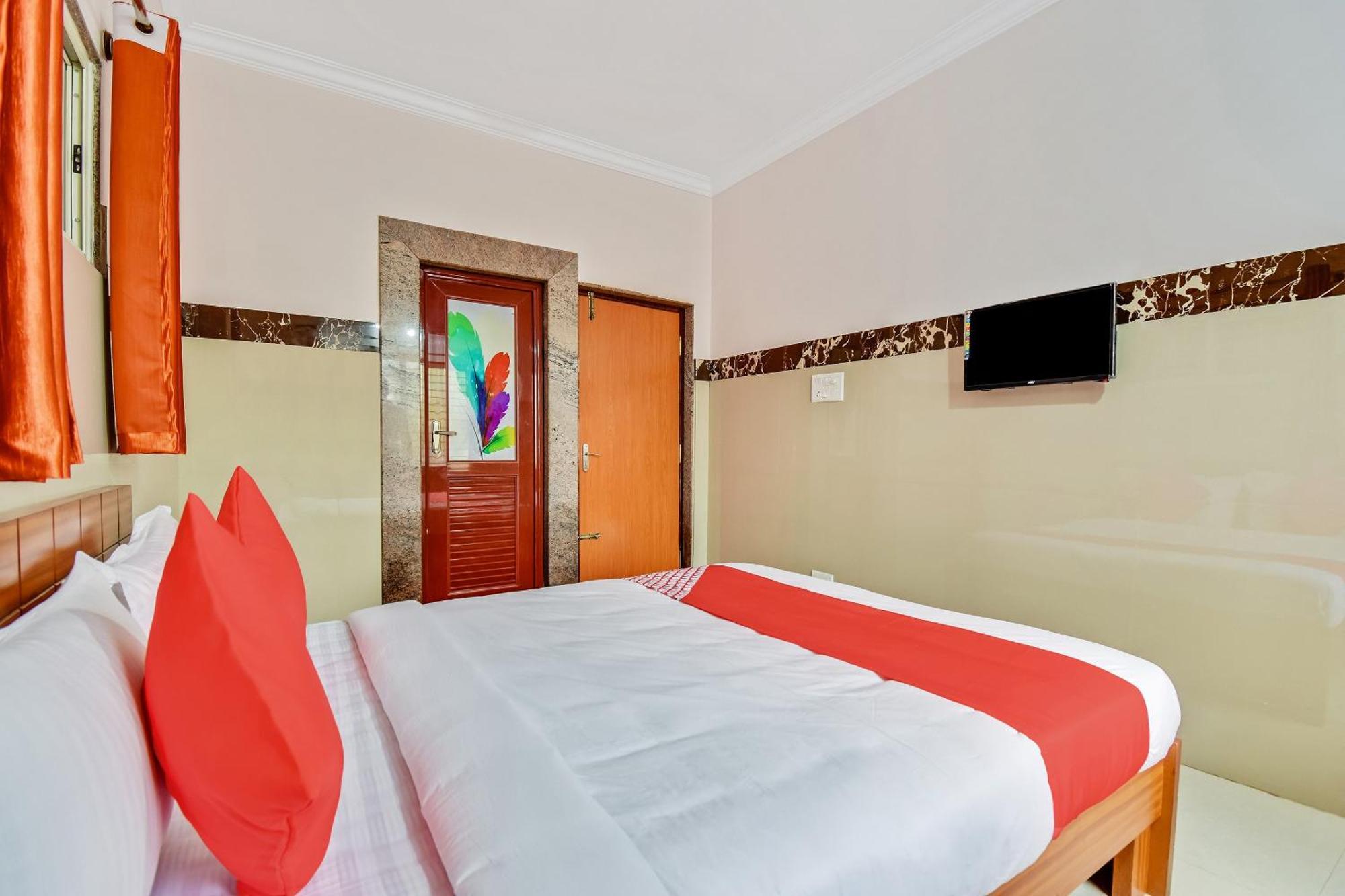 Hotel O Sri Sai Guru Comforts Yelahanka Kültér fotó