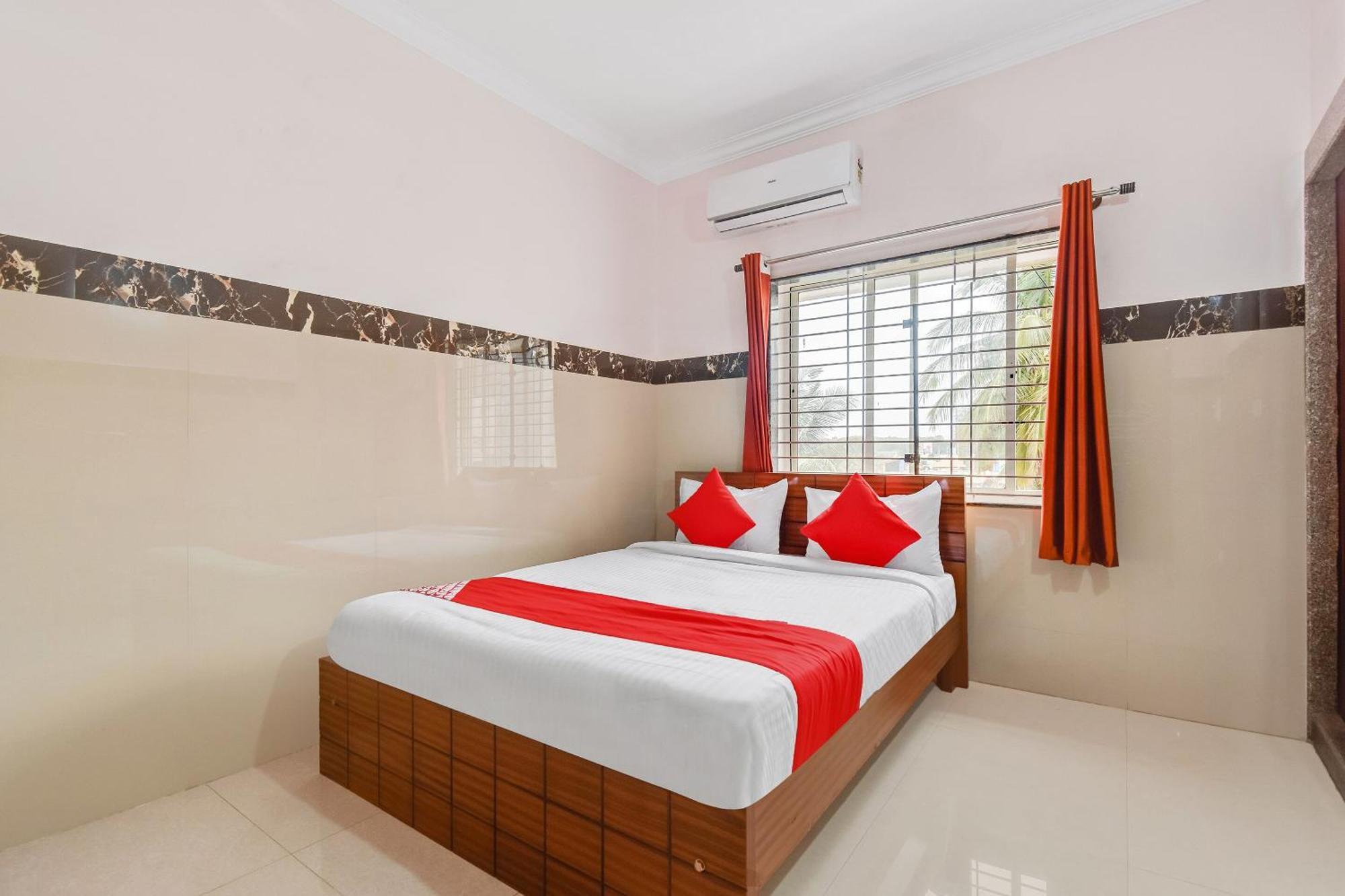 Hotel O Sri Sai Guru Comforts Yelahanka Kültér fotó