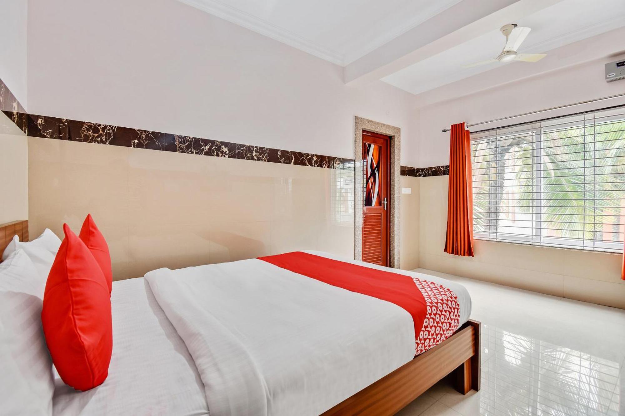 Hotel O Sri Sai Guru Comforts Yelahanka Kültér fotó