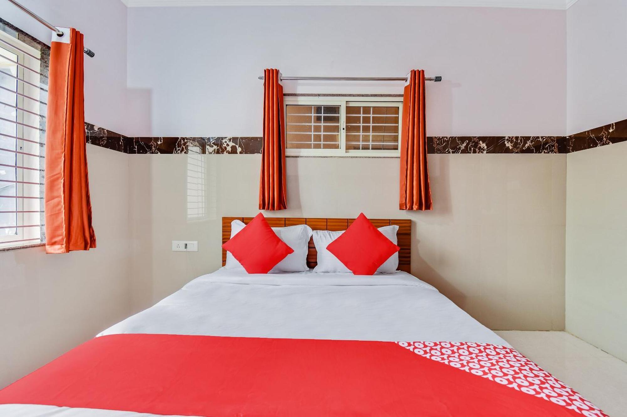 Hotel O Sri Sai Guru Comforts Yelahanka Kültér fotó