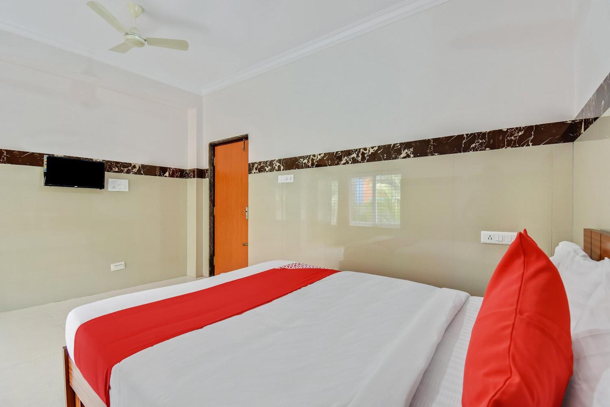 Hotel O Sri Sai Guru Comforts Yelahanka Kültér fotó