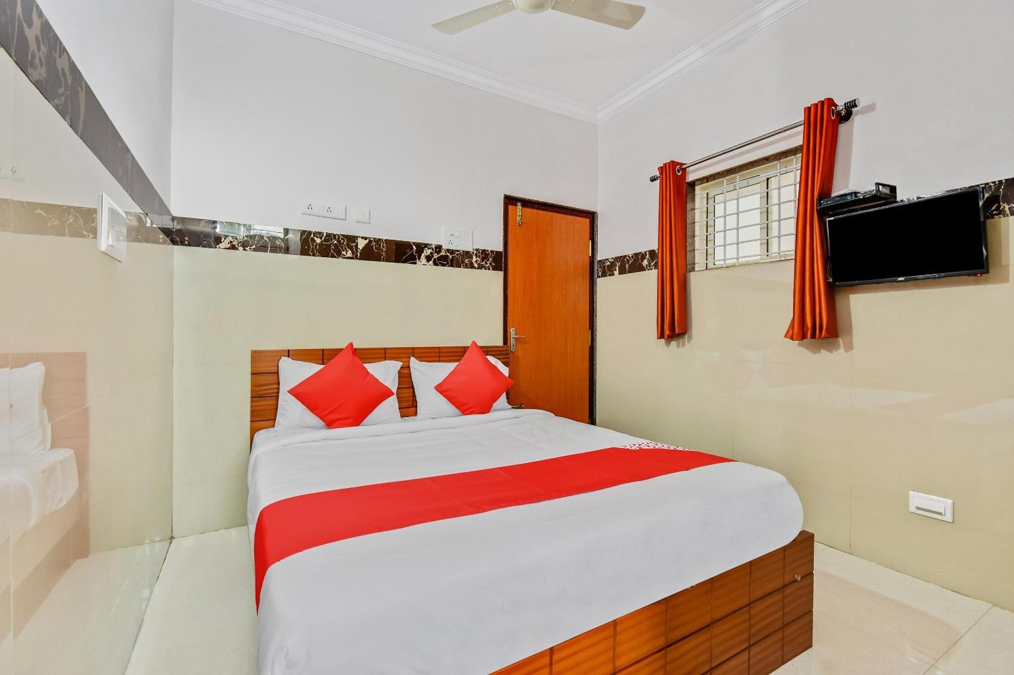 Hotel O Sri Sai Guru Comforts Yelahanka Kültér fotó