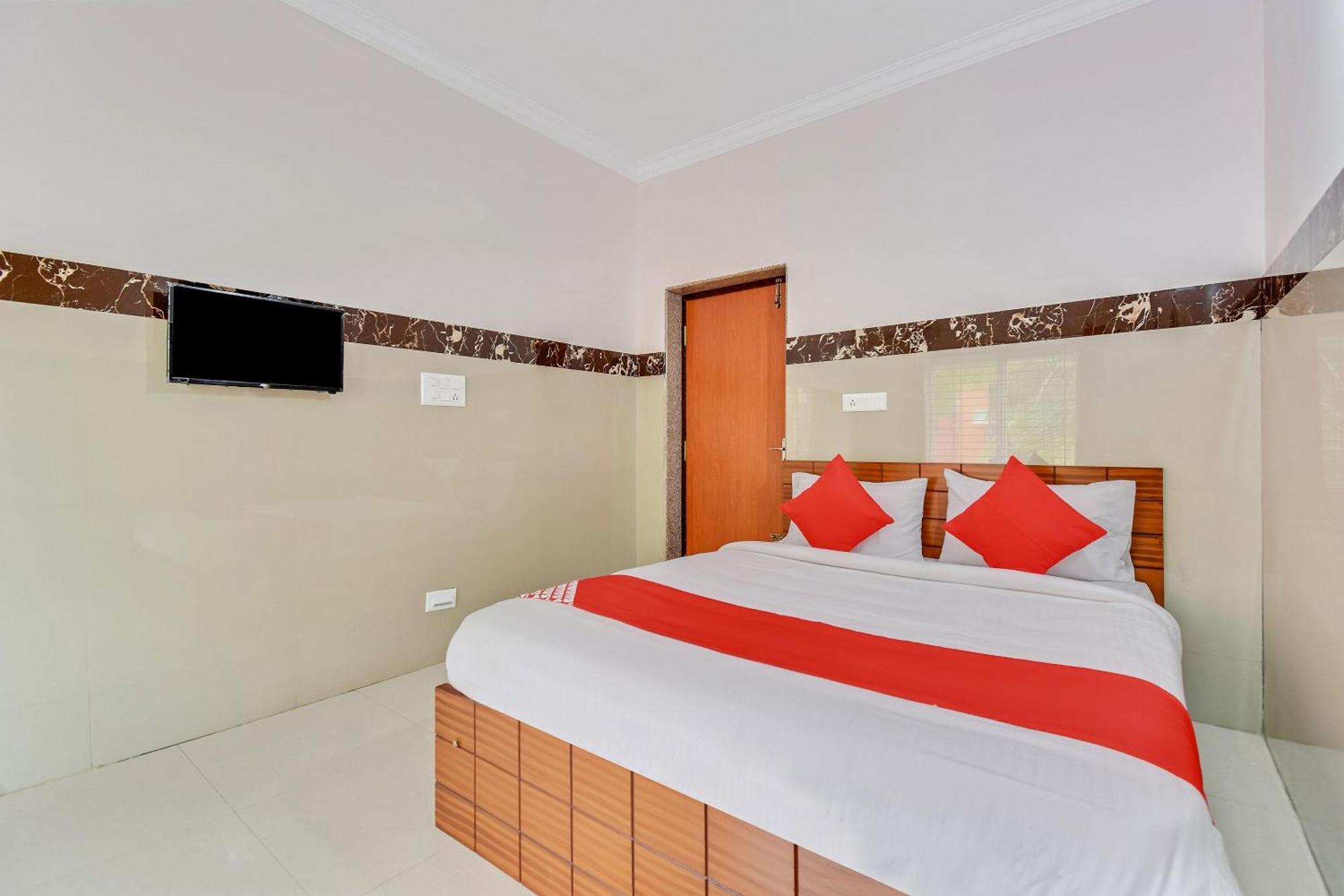 Hotel O Sri Sai Guru Comforts Yelahanka Kültér fotó