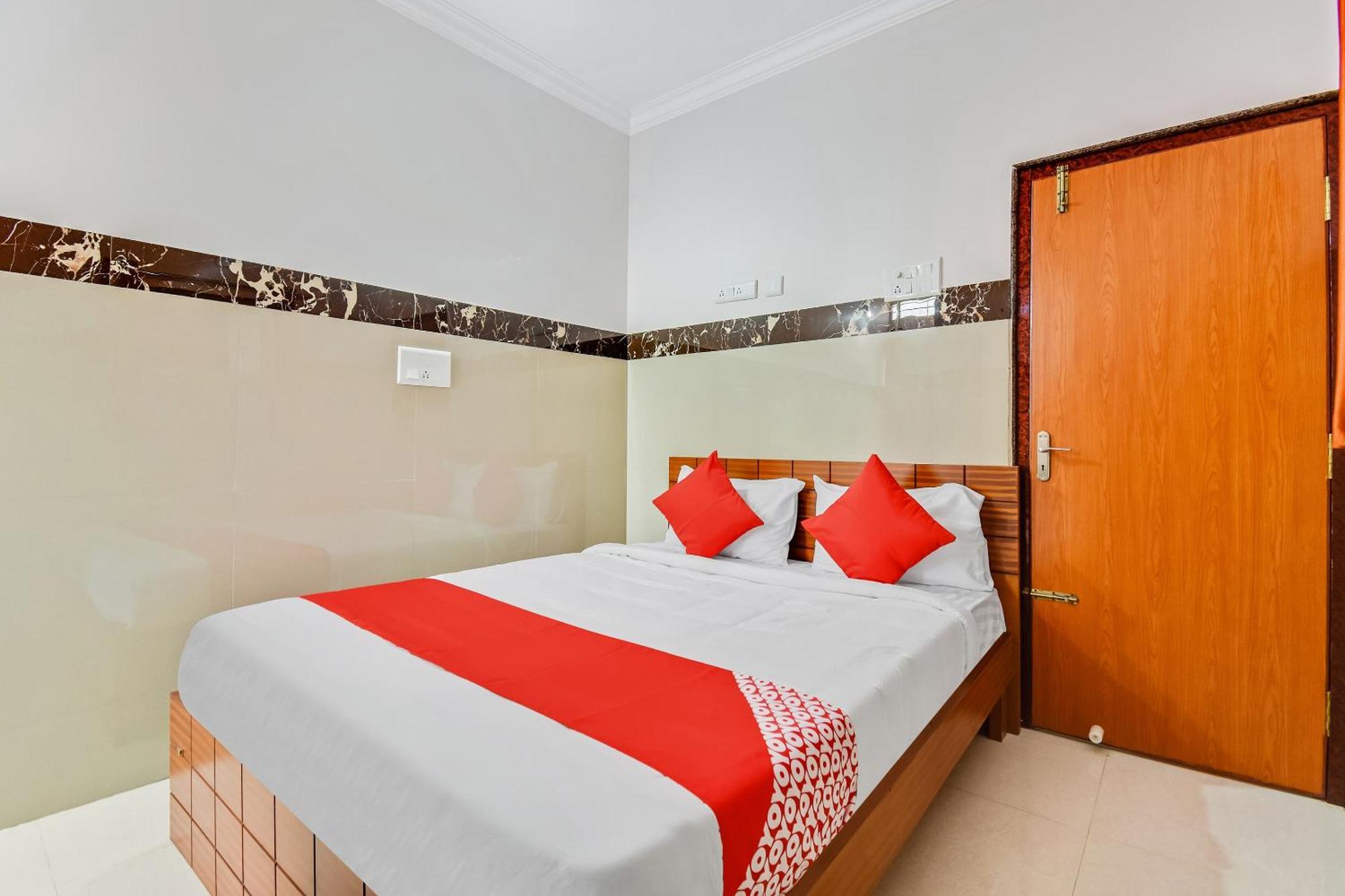 Hotel O Sri Sai Guru Comforts Yelahanka Kültér fotó