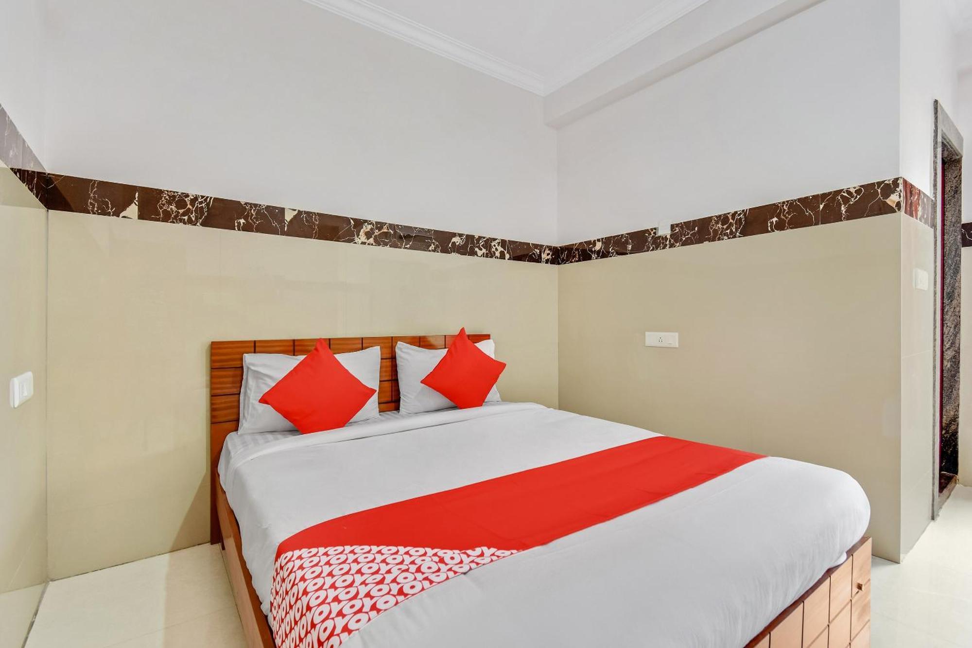 Hotel O Sri Sai Guru Comforts Yelahanka Kültér fotó